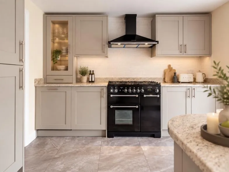 Shaker-style cabinetry with a Rangemaster oven and cooker hood