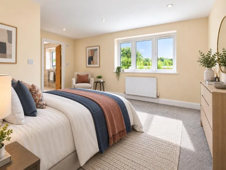 First-floor double bedroom with windows overlooking the garden